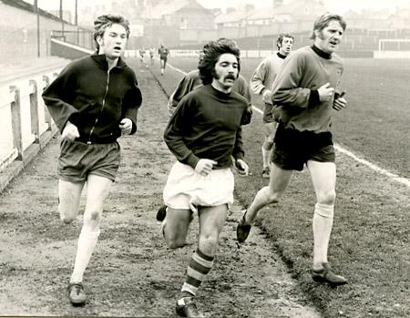 12/03/71: Dave Chambers (centre) signed until the end of the season from Southend United, has a training spell with Mick Waterworth, Paul Aimson and Barry Swallow before the team leaves for Windsor where they stay before a vital game at Aldershot.