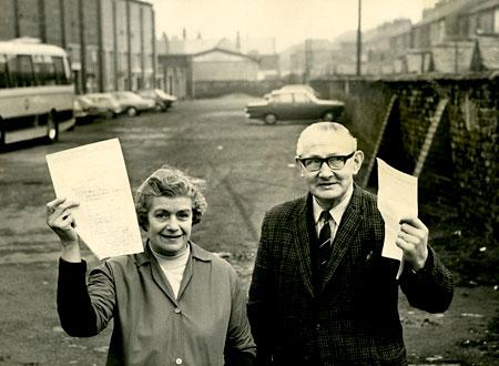 Mrs M Hamilton and Mr F Crawford display petitions against York City's plan to site a Sunday market on the club's car park.