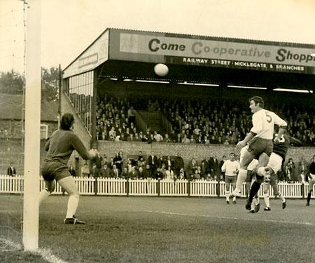 25/09/71 - York City 2, Walsall 0: Kevin McMahon beats Walsall centre half Jones, to a cross but this effort went just wide.