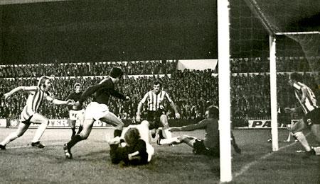 03/10/71 - Sheffield United 3, York City 2 (League Cup 3rd round): Chris Topping strides in to score City's second goal with Hope and Barry Swallow on the ground, and Badger trying to stop the Topping shot.