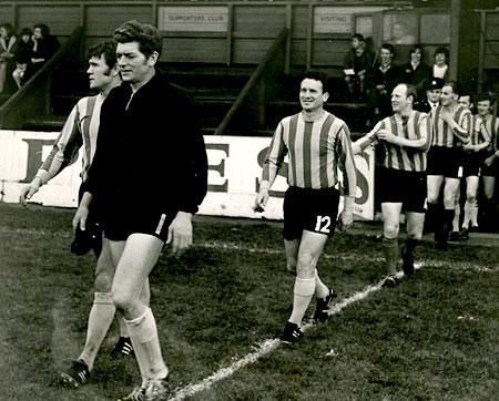 11/10/71: Tommy Forgan, City's former goalkeeper, leads the York & District Sportmen's XI out for a benefit match at Clarence Street yesterday. Other ex-City players include Ron Spence, Gerry Baker and Billy Fenton... & former York RL's Willy Hargreaves