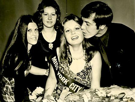 27/04/73 - Graeme Crawford gives a kiss of congratulations to Sue Firby who was chosen Miss York City at the Supporters' Club. Looking on are Elaine Britton (left), runner up, and Janet Wrigley (third).