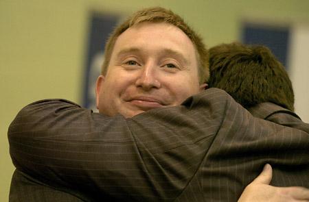 Newly-elected Labour councillor Dafydd Williams is given a celebratory hug by Labour leader James Alexander after the Westfield ward result 