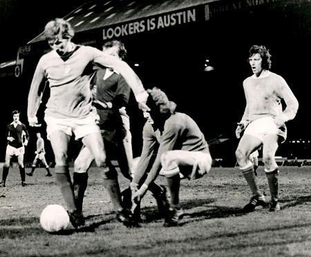 4/12/73: York City 0, Manchester City 0 (League Cup) - Manchester City forward Colin Bell dibbles the ball clear of Jimmy Seal with MacRae racing out of his goal.