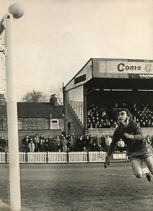 24/11/73 - FA Cup Round 1 - York City 0, Mansfield 0: The camera catches the moment when a match can be won or lost. Mansfield 'keeper Rod Arnold races back with a look of anxiety as this shot from John Peachey hits the crossbar.
