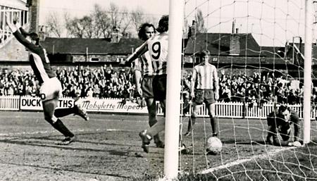 30/03/74: York City 3, Brighton 0 - Striker Chris Jones turns away in triumph after scoring the third goal against Brighton. Keeper Brian Powney is seen on his knees after diving to a Seal header which hit the post, John Woodward crossing the rebound.