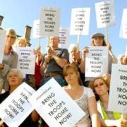 SYMPATHY: Campaigners outside York Railway Station at the York Against The War Vigil yesterday evening