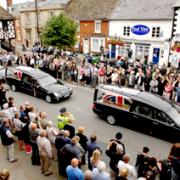 The hearses carrying the coffins of Lance Bombardier Matthew Hatton, inset, Captain Mark Hale, and Rifleman Daniel Wild move through the town of Wooton Bassett