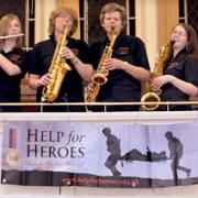 Members of Generation Groove tune up before the start of the Help For Heroes fundraising concert, in memory of Matthew Hatton, which was held at Haxby Methodist Church.