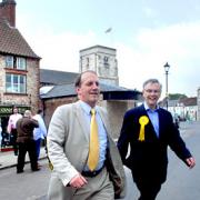 Liberal Democrat MP Simon Hughes, left, steps out in Malton Market Place with the party’s candidate, Howard Keal