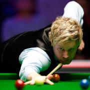 Neil Robertson in action during day three of the UK Championship at the York Barbican. Picture: Zac Goodwin/PA Wire