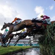 Noble Yeats ridden by Sam Waley-Cohen at the waterjump on their way to victory in the Grand National. Picture: PA Wire
