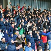 York City fans, pictured in full voice in the South Stand at the LNER Community Stadium Picture: Tom Poole
