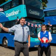 ON THE BALL … Coastliner General Manager Kel Pizzuti (left) and driver Adam Needham with a specially named bus in honour of Whitby-born England European Championship winner Beth Mead