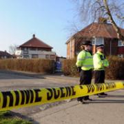 Police at the sealed-off crime scene on Middleton Road in Acomb, York