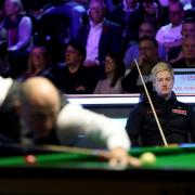 Neil Robertson (right) watches on during his Cazoo UK Championship match at the York Barbican against Joe Perry. Picture: Will Matthews/PA Wire