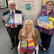 Children's author, Christina Gabbitas (centre), with Viv Sharp from Selby Library, and Neil Irving, Assistant Director of policy and partnerships at North Yorkshire County Council.