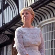 Jo Norris models a wedding dress available from Save The Children charity shop in Goodramgate, York