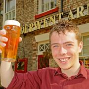 Luke Ives, a barman at the Derwent Arms in Norton who is only 19, celebrates his victory for the Conservatives