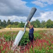 Marylen Parker pictured with the giant 10ft trowel at Breezy Knees gardens near York