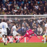 Leeds United's Crysencio Summerville scores his side's fourth goal against Huddersfield Town.