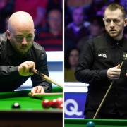 Luca Brecel (left) started his UK Championship bid with victory, whilst reigning champion Mark Allen (right) suffered defeat in his opener.