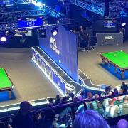 A spectator was stretchered from the crowd and play paused on day five of the UK Snooker Championships.