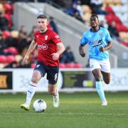 Paddy McLaughlin retains possession in York City's Vanarama National League fixture with Maidenhead United.