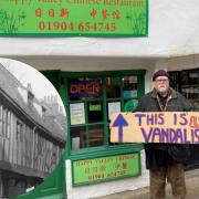 Gordon Campbell-Thomas with his sign protesting outside the Happy Valley Chinese restaurant in Goodramgate and, inset, Our Lady's Row in the 1910s