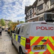 Two police vans and an ambulance at the scene of an incident in Pavement in York