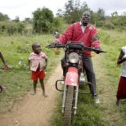Rogers Ochieng Otieno on his motorbike.  All pictures: Tom Pilston