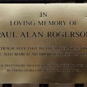 A plaque in memory of Paul Rogerson by the River Ouse