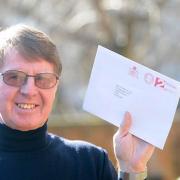 David Brown with his letter from Buckingham Palace informing him he is to receive Maundy Money