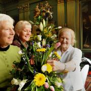 From left, Maureen White, Marilyn Kirkham and Evelyn Pennington, of York Flower Club, at work on the blooms in the Mansion House for today’s visit by the Queen
