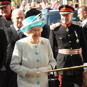 The Queen arrives at Micklegate Bar and is greeted by the historic Sigismund Sword before she enters the city flanked by Prince Philip and Lord Crathorne