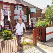 Jenny Oxley outside her home in Stuart Road, Acomb, which has been decorated to support England’s Euro 2012 campaign