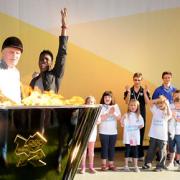 Harvey Smith lights the Olympic cauldron