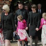 Steve Barber's long term partner Donna Rogers (left) and John Taylor's widow Karine Taylor leave St Everilda's Church, Nether Poppleton, after the joint memorial service.