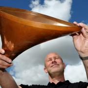 Stage One sales director Simon Wood with a prototype of the copper petals which were used in the London 2012 Olympics opening  ceremony
