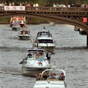 A group of boats join the flotilla as crowds watch from Skeldergate Bridge