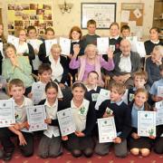 Pupils at St Aelred’s RC Primary School with residents at Woolnough House in Tang Hall