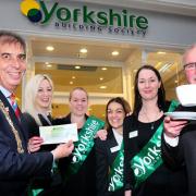 Coun Keith Hyman, the Lord Mayor of York, with Yorkshire Building Society staff Leanne Jones, Rosie Brierley, Sally Tomlinson and Hannah Turney, and fundraiser Graham Bradbury