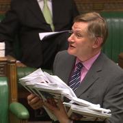 York Central MP Hugh Bayley in the House of Commons with the petition forms