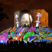 Clifford’s Tower lit up during the Illuminating York event