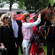 Libertarian and jockey William Buick with trainer Elaine Burke, and her husband, Karl, after victory in the Betfred Dante Stakes at York