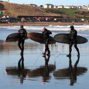 Surfers at the North Bay, Scarborough. Pictures: Martin Oates