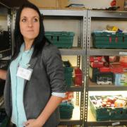Laura Hagues, project manager, checks the stock at  the York Food Bank in Acomb