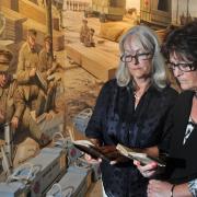 The decoded diaries of Wass Reader of the 1st East Riding Yeomanry C Squadron, at York’s Castle Museum. Pictured with the original diaries are Linda Bird, left and Suzy Brown, who transcribed the original shorthand