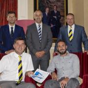Jonathan Greening, front right with manager Paul Marshall, and back, from left, Tadcaster  directors James Gore, Kent Mayall and Matt Gore