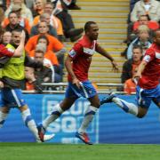 Ashley Chambers, right, runs to accept the acclaim after his goal at Wembley against Luton Town